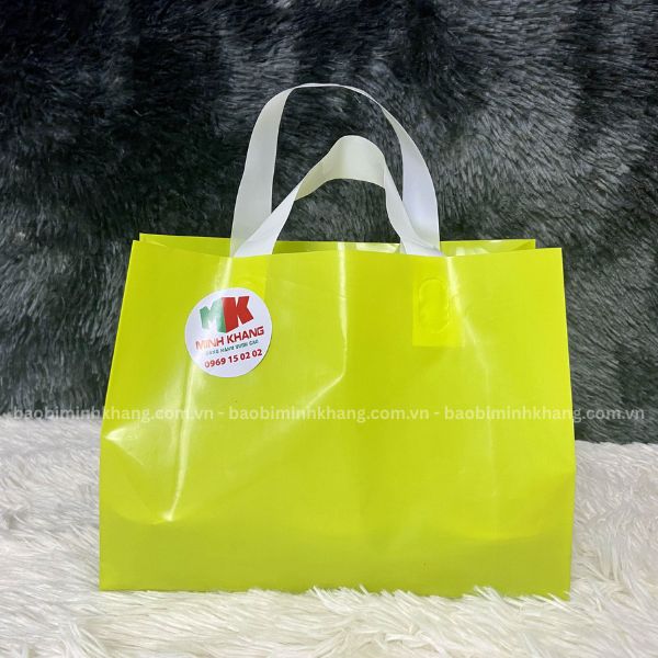 tui-quai-ep-mau-xanh-bo-quai-trang Túi quai ép màu xanh bơ quai trắng